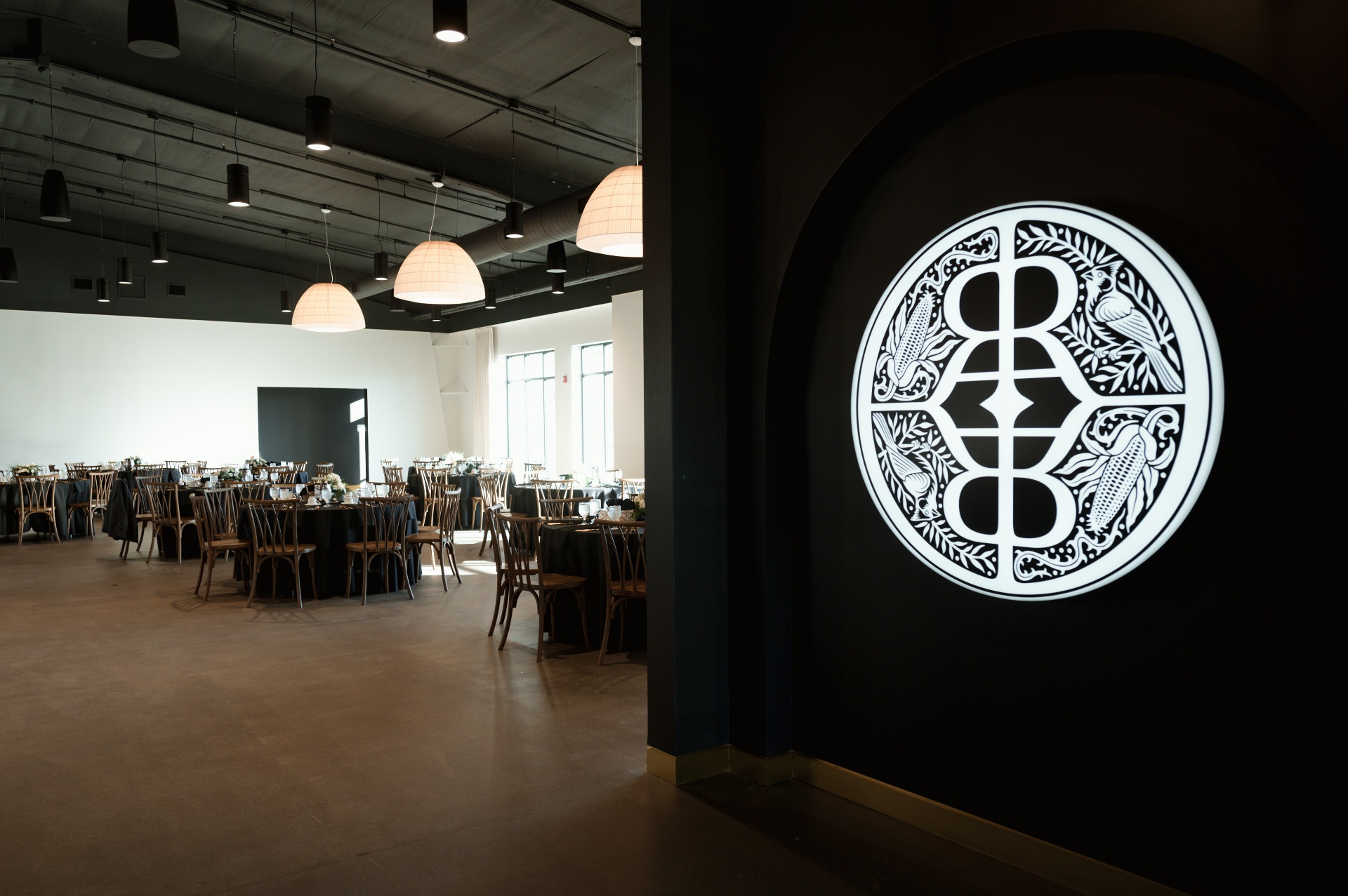 The Barrel Room reception hall with branded archway