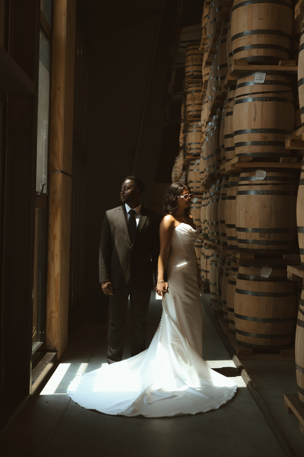 Bride and groom standing together at The Barrel Room