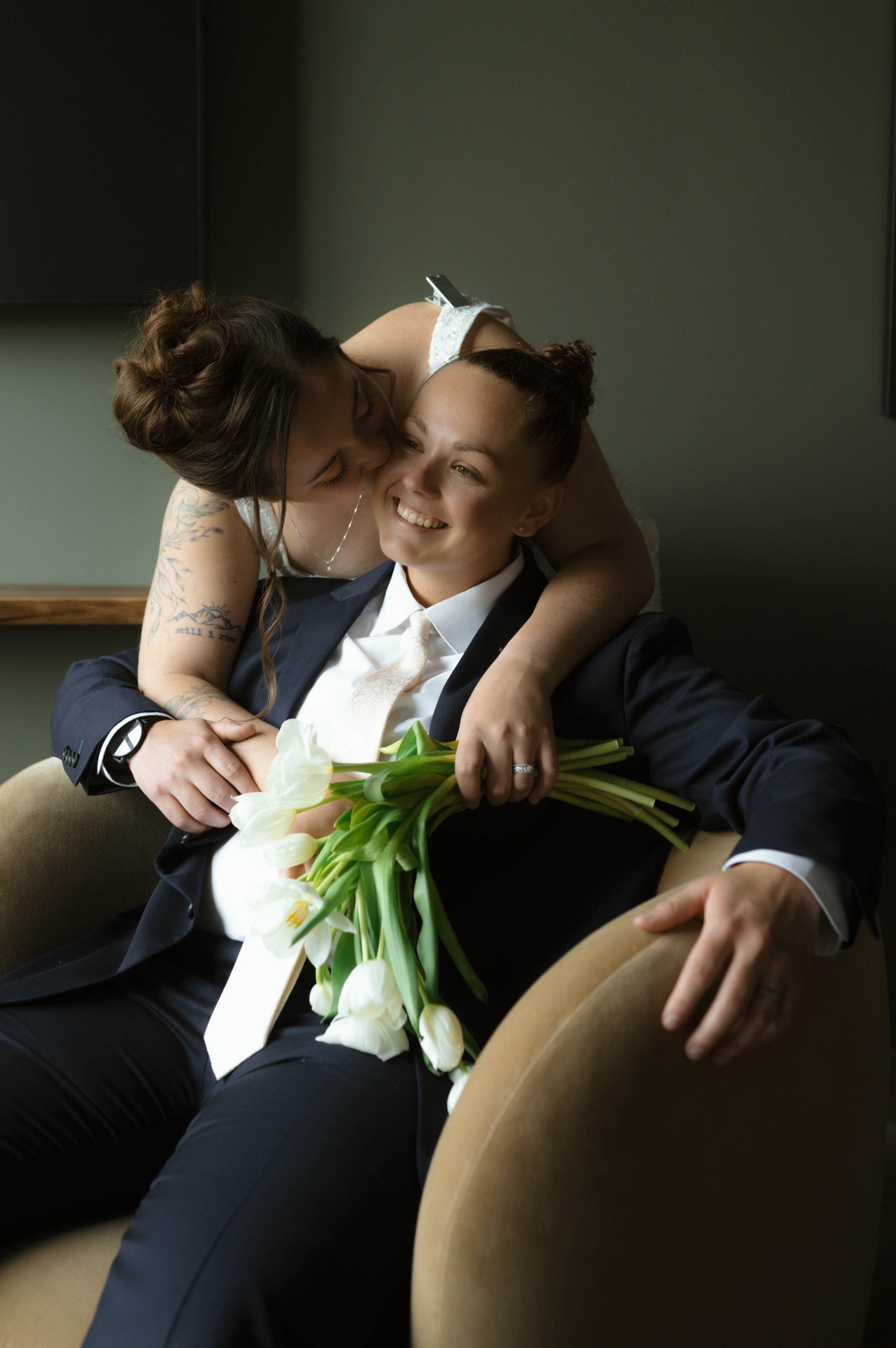 Couple sharing a quiet moment in the bridal suite
